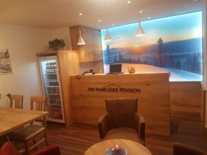 Reception und Empfangsbereich Hotel Pension Oberauer in Wagrain Urlaub Salzburg auf 365Austria
